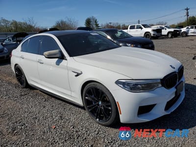 Czwarte zdjęcie samochodu z boku: 2018 BMW M5 VIN:WBSJF0C57JB282565 - miniatura