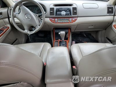Zdjęcie 8 z 13 samochodu: 2004 TOYOTA CAMRY LE VIN:4T1BF30K74U080949 - miniatura