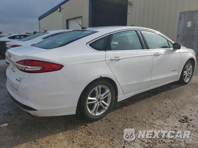 Trzecie zdjęcie samochodu z tyłu: 2018 FORD FUSION SE HYBRID VIN:3FA6P0LUXJR129973 - miniatura