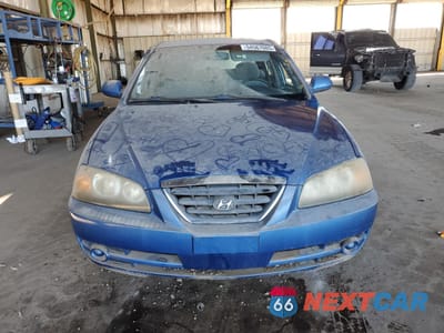 Piąte zdjęcie samochodu w środku: 2004 HYUNDAI ELANTRA GLS VIN:KMHDN46DX4U832685 - miniatura