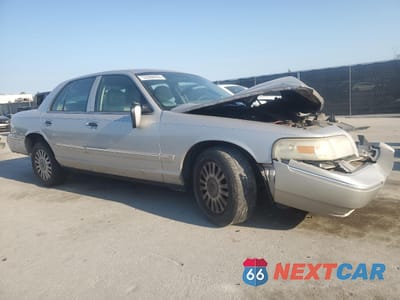 Czwarte zdjęcie samochodu z boku: 2007 MERCURY GRAND MARQUIS LS VIN:2MEFM75V77X625307 - miniatura