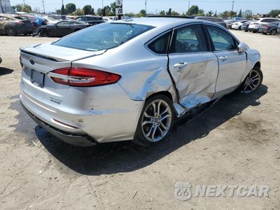 Trzecie zdjęcie samochodu z tyłu: 2019 FORD FUSION TITANIUM VIN:3FA6P0RU7KR181327 - miniatura