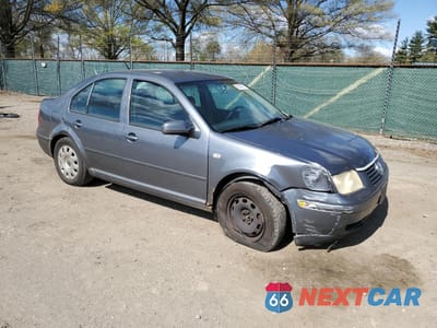 Czwarte zdjęcie samochodu z boku: 2003 VOLKSWAGEN JETTA GL VIN:3VWRK69M43M142988 - miniatura