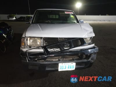 Piąte zdjęcie samochodu w środku: 1998 NISSAN FRONTIER KING CAB XE VIN:1N6DD26Y3WC351312 - miniatura