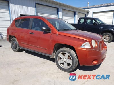 Czwarte zdjęcie samochodu z boku: 2009 JEEP COMPASS SPORT VIN:1J4FF47B49D135411 - miniatura