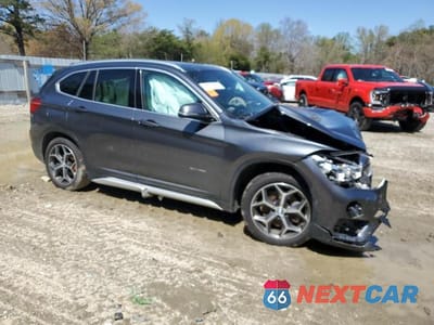 Czwarte zdjęcie samochodu z boku: 2018 BMW X1 XDRIVE28I VIN:WBXHT3C39J5K22593 - miniatura