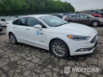 Czwarte zdjęcie samochodu z boku: 2017 FORD FUSION SE HYBRID VIN:3FA6P0LU5HR359558 - miniatura