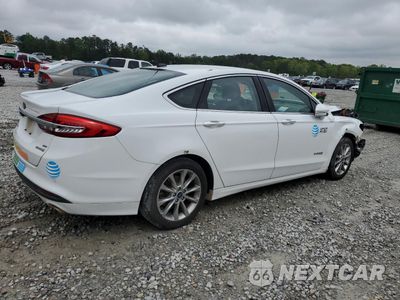 Trzecie zdjęcie samochodu z tyłu: 2017 FORD FUSION SE HYBRID VIN:3FA6P0LU6HR409612 - miniatura