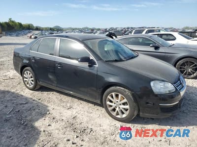 Czwarte zdjęcie samochodu z boku: 2010 VOLKSWAGEN JETTA SE VIN:3VWRX7AJ5AM041237 - miniatura