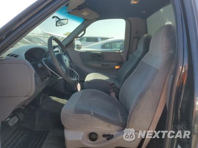 Zdjęcie 7 z 12 samochodu: 1999 FORD F150 VIN:2FTRF07L0XCA61650 - miniatura
