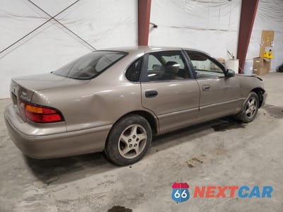 Trzecie zdjęcie samochodu z tyłu: 1999 TOYOTA AVALON XL VIN:4T1BF18B0XU339942 - miniatura