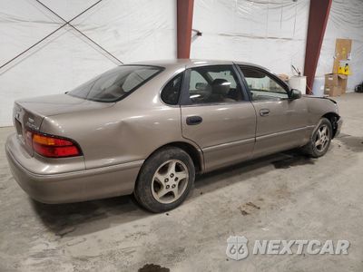 Trzecie zdjęcie samochodu z tyłu: 1999 TOYOTA AVALON XL VIN:4T1BF18B0XU339942 - miniatura