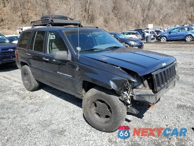 Czwarte zdjęcie samochodu z boku: 1998 JEEP GRAND CHEROKEE LAREDO VIN:1J4GZ58S5WC326028 - miniatura