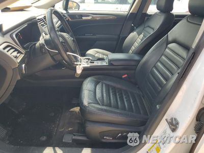 Zdjęcie 7 z 12 samochodu: 2017 FORD FUSION SE HYBRID VIN:3FA6P0LU4HR409723 - miniatura
