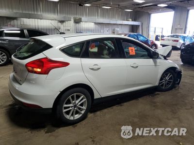 Trzecie zdjęcie samochodu z tyłu: 2017 FORD FOCUS SE VIN:1FADP3K2XHL268437 - miniatura