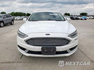 Piąte zdjęcie samochodu w środku: 2018 FORD FUSION SE HYBRID VIN:3FA6P0LU2JR171652 - miniatura