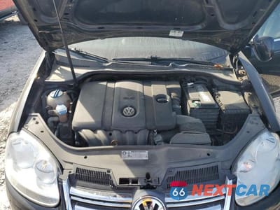 Zdjęcie 11 z 12 samochodu: 2010 VOLKSWAGEN JETTA SE VIN:3VWRX7AJ5AM041237 - miniatura