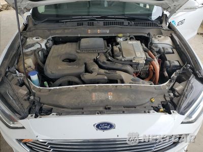 Zdjęcie 11 z 13 samochodu: 2018 FORD FUSION SE HYBRID VIN:3FA6P0LU7JR163532 - miniatura