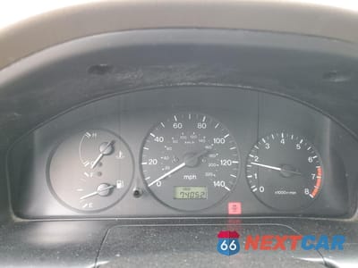 Zdjęcie 9 z 14 samochodu: 1998 MAZDA PROTEGE DX VIN:JM1BC1411W0238344 - miniatura