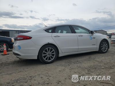 Trzecie zdjęcie samochodu z tyłu: 2017 FORD FUSION SE HYBRID VIN:3FA6P0LU4HR409124 - miniatura