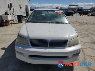 Piąte zdjęcie samochodu w środku: 2002 MITSUBISHI LANCER OZ RALLY VIN:JA3AJ86E12U073293 - miniatura