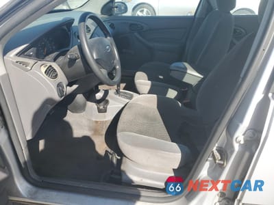 Zdjęcie 7 z 14 samochodu: 2003 FORD FOCUS LX VIN:1FAFP33P23W311601 - miniatura