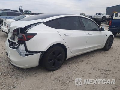 Trzecie zdjęcie samochodu z tyłu: 2023 TESLA MODEL 3 VIN:5YJ3E1EB8PF633162 - miniatura