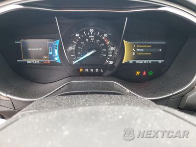 Zdjęcie 9 z 13 samochodu: 2018 FORD FUSION SE HYBRID VIN:3FA6P0LU2JR171974 - miniatura