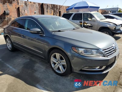 Czwarte zdjęcie samochodu z boku: 2014 VOLKSWAGEN CC SPORT VIN:WVWBP7ANXEE532129 - miniatura