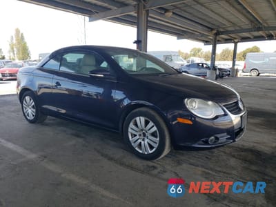 Czwarte zdjęcie samochodu z boku: 2009 VOLKSWAGEN EOS TURBO VIN:WVWBA71F09V020198 - miniatura