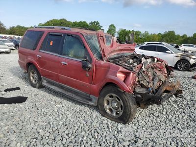 Czwarte zdjęcie samochodu z boku: 2001 LINCOLN NAVIGATOR VIN:5LMFU28R51LJ25596 - miniatura