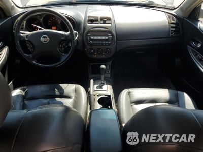 Zdjęcie 8 z 12 samochodu: 2002 NISSAN ALTIMA BASE VIN:1N4AL11D12C194810 - miniatura