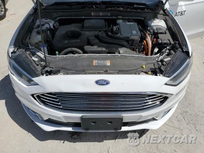 Zdjęcie 11 z 12 samochodu: 2018 FORD FUSION SE HYBRID VIN:3FA6P0LU3JR129894 - miniatura