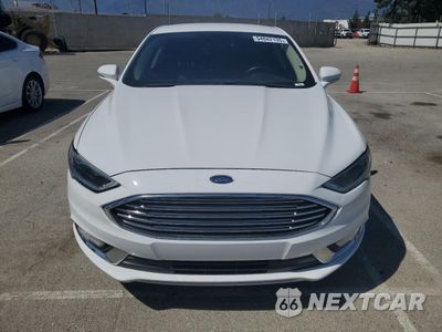Piąte zdjęcie samochodu w środku: 2017 FORD FUSION SE HYBRID VIN:3FA6P0LU9HR409166 - miniatura