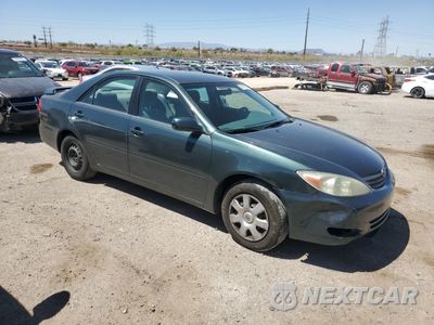 Czwarte zdjęcie samochodu z boku: 2002 TOYOTA CAMRY LE VIN:JTDBE32K720064534 - miniatura