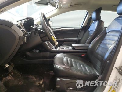 Zdjęcie 7 z 13 samochodu: 2017 FORD FUSION SE HYBRID VIN:3FA6P0LU1HR359637 - miniatura
