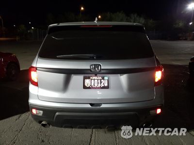 Zdjęcie 6 z 12 samochodu: 2021 HONDA PASSPORT EXL VIN:5FNYF7H53MB001063 - miniatura