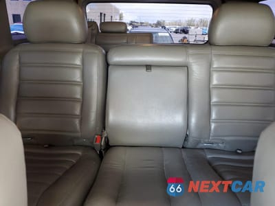 Zdjęcie 10 z 13 samochodu: 2003 HUMMER H2 VIN:5GRGN23U63H142867 - miniatura