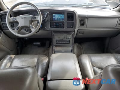 Zdjęcie 8 z 13 samochodu: 2004 GMC YUKON XL DENALI VIN:1GKFK66U14J286219 - miniatura