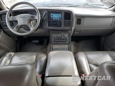 Zdjęcie 8 z 13 samochodu: 2004 GMC YUKON XL DENALI VIN:1GKFK66U14J286219 - miniatura