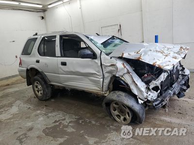 Czwarte zdjęcie samochodu z boku: 2002 ISUZU RODEO S VIN:4S2DM58W924331185 - miniatura