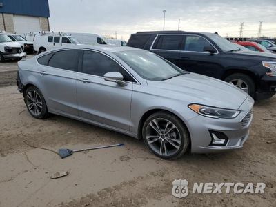 Czwarte zdjęcie samochodu z boku: 2020 FORD FUSION TITANIUM VIN:3FA6P0K98LR127784 - miniatura