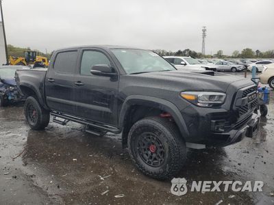 Czwarte zdjęcie samochodu z boku: 2023 TOYOTA TACOMA DOUBLE CAB VIN:3TYCZ5AN7PT124806 - miniatura
