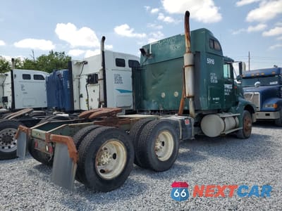Czwarte zdjęcie samochodu z boku: 1997 INTERNATIONAL 9200 SEMI TRUCK VIN:2HSFMAHR1VC029232 - miniatura