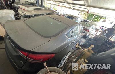 Czwarte zdjęcie samochodu z boku: 2017 FORD FUSION SE VIN:3FA6P0H79HR117620 - miniatura