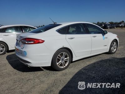 Trzecie zdjęcie samochodu z tyłu: 2018 FORD FUSION SE HYBRID VIN:3FA6P0LU4JR118824 - miniatura