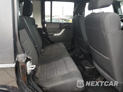 Zdjęcie 10 z 12 samochodu: 2011 JEEP WRANGLER UNLIMITED SAHARA VIN:1J4BA5H19BL615464 - miniatura