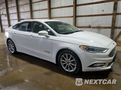 Czwarte zdjęcie samochodu z boku: 2017 FORD FUSION SE HYBRID VIN:3FA6P0LU4HR359647 - miniatura
