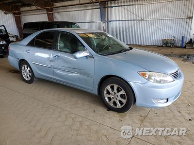 Czwarte zdjęcie samochodu z boku: 2005 TOYOTA CAMRY LE VIN:JTDBF30KX50161862 - miniatura