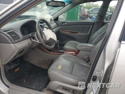 Zdjęcie 7 z 12 samochodu: 2003 TOYOTA CAMRY LE VIN:4T1BF30K53U552094 - miniatura